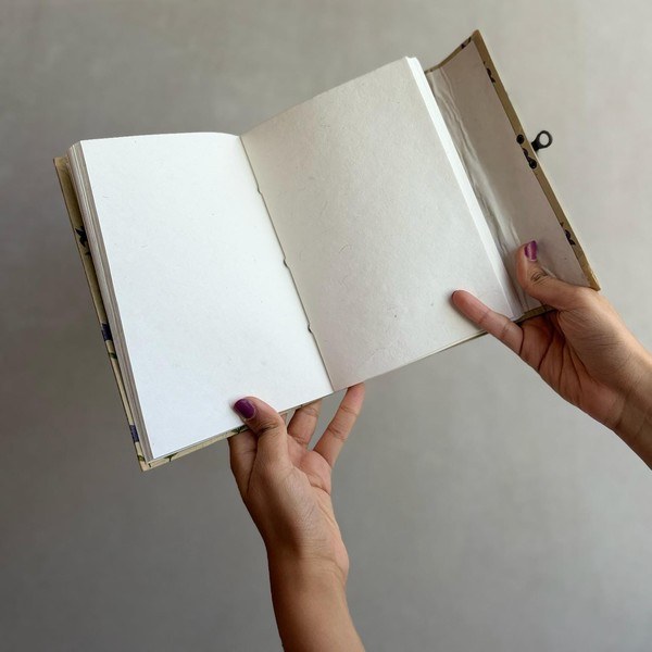 The inside pages of a paisley notebook, sustainable art paper.